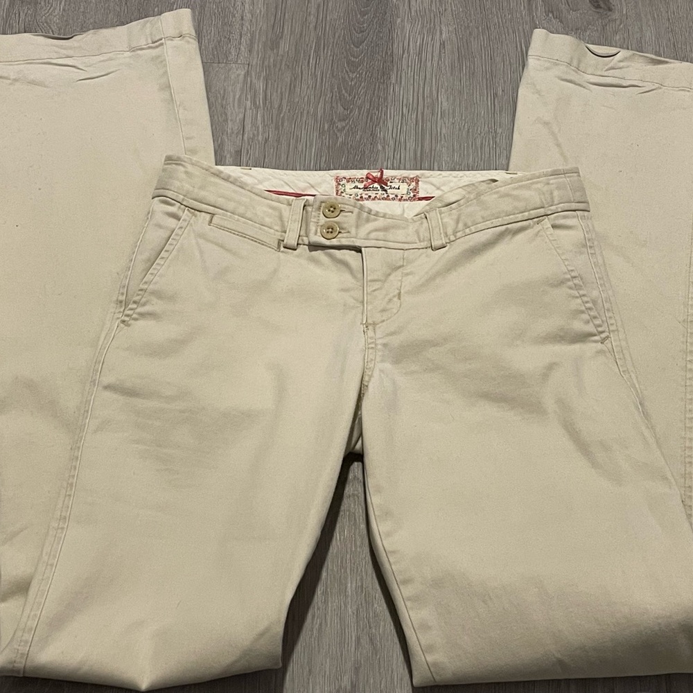 Beige boot cut trousers